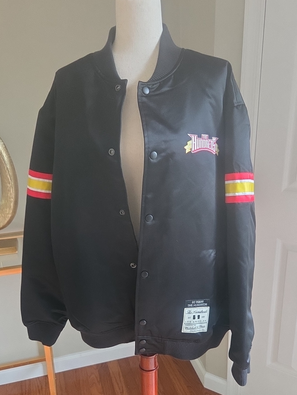 The Hundreds Black Varsity Jacket with Red & Yellow Stripes